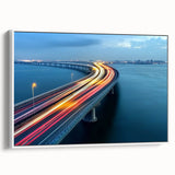 Framed landscape canvas artwork depicting a serene bridge scene with lush greenery, showcasing vibrant colors and intricate details, perfect for home decor.