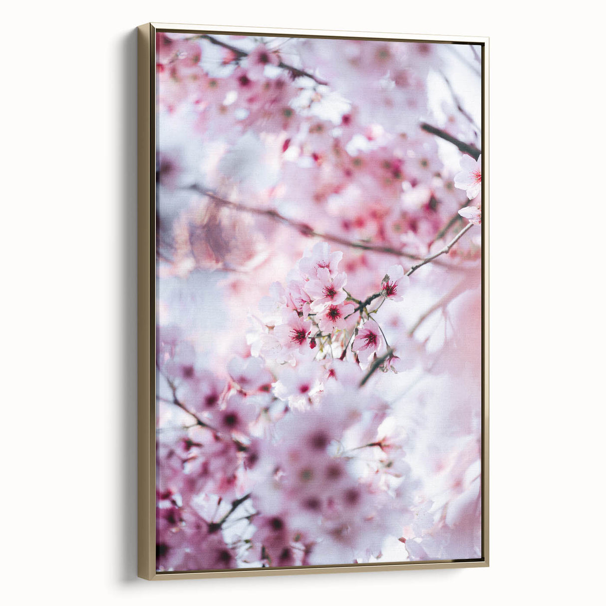 Framed canvas depicting a vintage-style landscape painting with spring themes in a palette of gold and black.