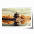 Rolled landscape print showcasing a picturesque castle against a vibrant sunset backdrop, elegantly packaged in a protective cardboard tube for shipping.