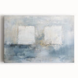 Abstract geometric stretched canvas artwork showcasing vibrant blue and orange shapes, perfect for modern home decor. Ideal for enhancing living spaces with a contemporary touch.