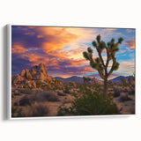 Framed canvas artwork displaying a serene landscape of open fields with soft green grass and a bright blue sky, showcased from a white side view for an elegant presentation.