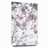 Large abstract wall art on acrylic glass depicting spring themes in soft green and pink tones.