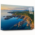 Stunning acrylic landscape artwork depicting dramatic cliffs, showcased in a sleek glass frame, with metal pins for secure display, perfect for modern decor.