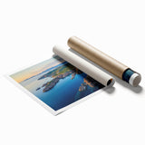 Stunning landscape print depicting dramatic cliffs and vibrant skies, rolled for easy shipping in a protective cardboard tube, perfect for home decor.