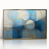 Framed acrylic artwork featuring an abstract geometric design in gold tones, perfect for modern home decor. The piece is displayed upright, highlighting its elegant frame and contemporary style.