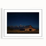 Landscape barn frame artwork featuring a white mat, showcasing a rustic farmhouse scene with vibrant greenery and a clear blue sky, ideal for home decor.