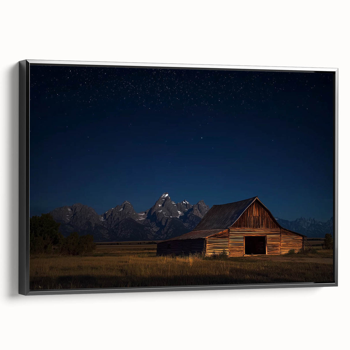 Landscape barn-themed canvas art with a black frame showcasing rustic charm, ideal for country-style decor, viewed from the side to highlight texture and framing.