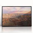 Framed acrylic artwork showcasing a stunning landscape of canyons, featuring vibrant colors and intricate details, set against a sleek black frame, ideal for modern home decor.