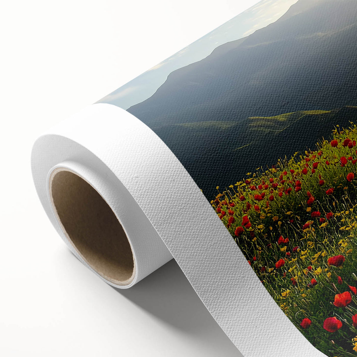 Vibrant rolled canvas artwork depicting a serene countryside landscape, showcasing lush green fields and a clear blue sky, elegantly packaged in a protective cardboard tube.