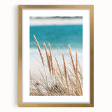 Extra large abstract art print in vibrant orange and yellow, framed in gold, ideal for living room decor.