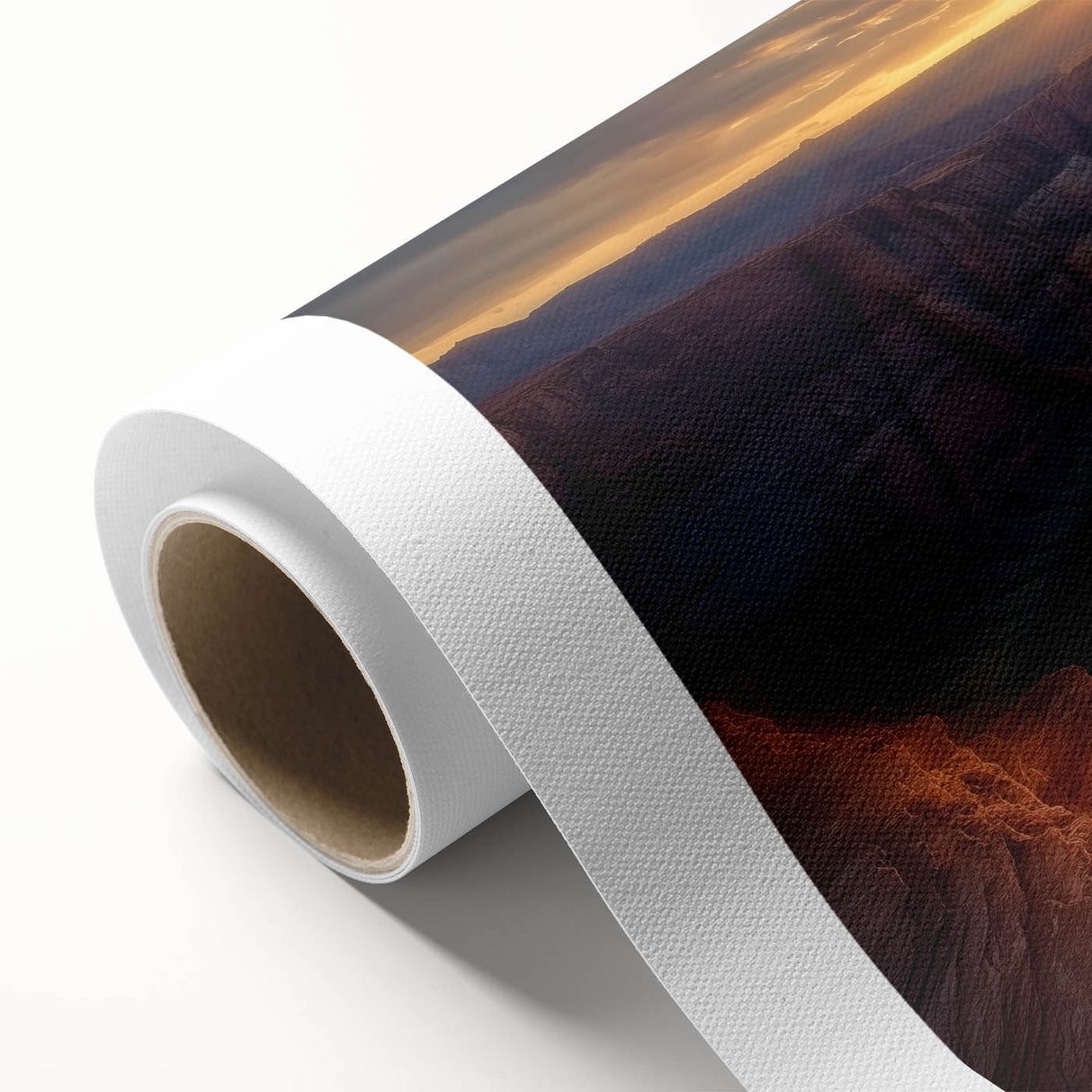 Vibrant rolled canvas artwork depicting stunning desert canyons at sunset, showcasing intricate details and rich colors, packaged securely for art enthusiasts.