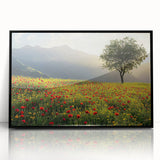 Framed acrylic landscape artwork showcasing a serene countryside scene, featuring lush green fields and a bright blue sky, presented in a sleek black frame.