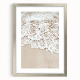 Textured art depicting an abstract summer scene in muted orange and blue tones on a silver-framed mat.