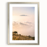 Textured abstract art print in muted gray and blue tones on a framed canvas, ideal for modern bedroom ambiance.