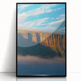 Framed acrylic artwork depicting a stunning landscape of rugged cliffs, featuring vibrant colors and intricate details that enhance any modern decor setting.