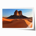 Desert landscape rolled canvas print showcasing vibrant hues of orange and yellow, depicting a serene sunset over sandy dunes, packaged in a protective tube.