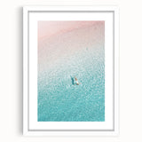 Abstract art print featuring swirling blue and green hues on a white framed canvas, ideal for dining room decor.