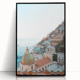 Large abstract wall art featuring swirling blue and orange tones on a black acrylic frame.