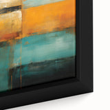 Close-up of a framed abstract wall art piece showcasing vibrant, multicolored strokes in shades of blue, orange, and yellow, perfect for modern home decor.