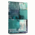 Abstract wall art featuring vibrant strokes in shades of blue, pink, and gold, displayed in a sleek acrylic glass frame with visible mounting pins, perfect for modern decor.