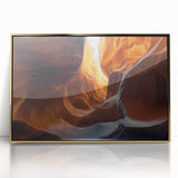 Framed acrylic artwork showcasing a stunning landscape with intricate cave formations, featuring gold accents and a sleek modern design, perfect for home decor.