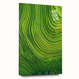 Acrylic glass artwork depicting a serene landscape of rolling green fields under a bright blue sky, presented in a modern side view, perfect for home decor.