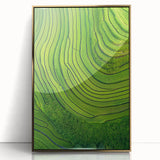 Framed acrylic artwork showcasing a vibrant landscape of golden fields under a blue sky, adding a touch of elegance and warmth to any modern home decor.