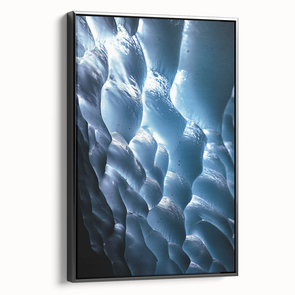 Framed canvas artwork showcasing a stunning cave landscape with rich textures and deep colors, featuring a sleek black frame that enhances its visual appeal. Ideal for nature lovers and home decor enthusiasts.