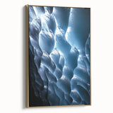 Framed canvas artwork showcasing a stunning landscape with intricate cave formations, highlighted by a gold frame, perfect for home decor and artistic ambiance.