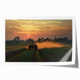 Rolled print showcasing a vibrant countryside landscape, featuring rolling hills and a serene sky, carefully packaged in a protective cardboard tube for shipping.