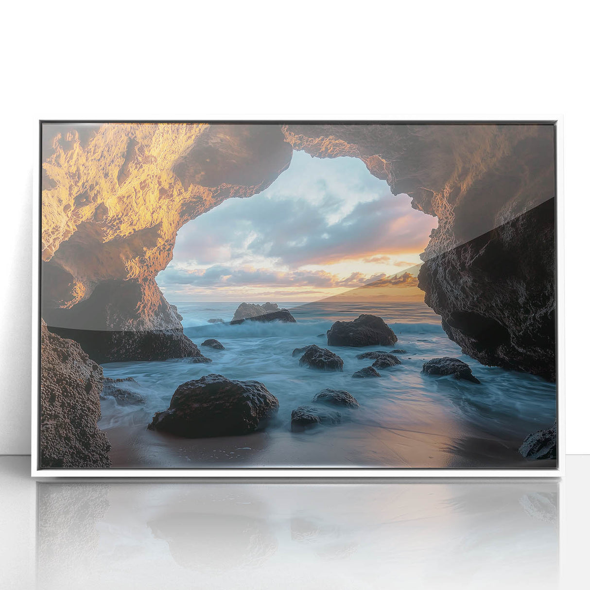 Framed acrylic landscape art print showcasing a serene cave scene with earthy tones, set in a white frame, ideal for modern home decor.