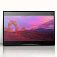 Framed acrylic artwork showcasing a vibrant desert landscape, featuring warm tones of orange and yellow with a sleek black frame, ideal for modern home decor.