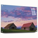 Landscape acrylic glass artwork depicting a vibrant barn scene, showcasing intricate details and colors, displayed with decorative pins against a neutral background. Ideal for rustic home decor enthusiasts and art collectors.