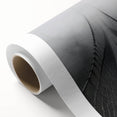 Rolled canvas showcasing a vibrant landscape bridge design with lush greenery and a serene water body, elegantly packaged in a protective cardboard tube for safe shipping.