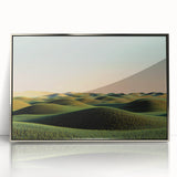 Framed acrylic artwork showcasing a serene countryside landscape with rolling hills and vibrant greenery, presented in a sleek silver frame, ideal for modern home decor.