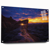 Desert landscape acrylic glass art showcasing vibrant hues of orange and yellow, set against a serene blue sky, mounted with sleek pins for modern display.