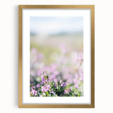 Extra large abstract art print depicting textured spring motifs in pastel shades, framed in gold.