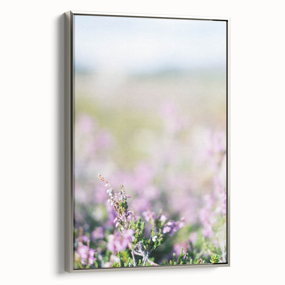 Framed canvas featuring a vintage landscape art painting with colorful spring scenery, ideal for brightening a living room.