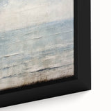 Framed canvas wall art showcasing an abstract design with vibrant strokes in shades of blue, yellow, and pink, perfect for modern home decor.