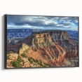 Framed canvas artwork depicting a scenic landscape of canyons, showcasing rich earth tones and dramatic rock formations, ideal for enhancing home decor and aesthetic appeal.