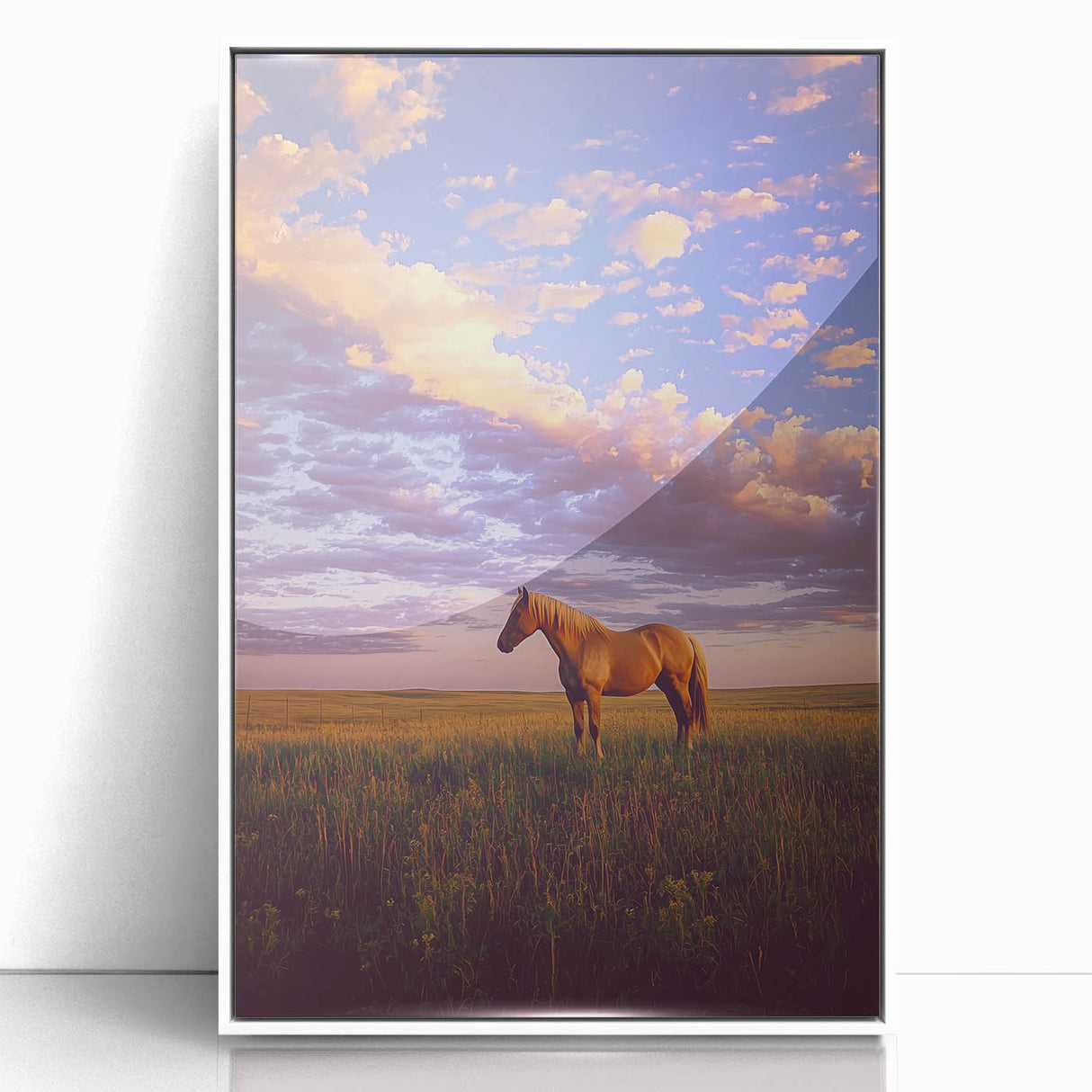 Framed acrylic landscape art depicting a serene countryside scene with rolling hills and a clear blue sky, presented in a sleek white frame for modern decor.