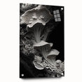 Large abstract wall art on acrylic glass featuring swirling blue and gray tones, suitable for bedroom or dining room decor.