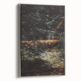 Framed canvas featuring a vintage landscape painting of autumn trees in vibrant orange and red tones.