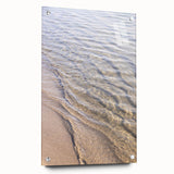 Large abstract wall art on acrylic glass depicting swirling blue and white patterns.