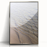 Mid-century modernist art featuring geometric shapes in pastel shades on a silver-framed acrylic print.