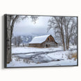 Framed landscape canvas artwork showcasing a picturesque barn scene, presented in a sleek black frame, ideal for rustic home decor and enhancing interior aesthetics.