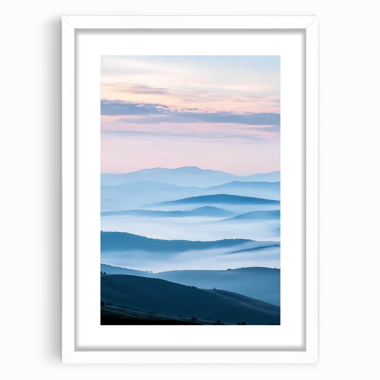 Framed landscape artwork depicting a serene countryside scene with lush greenery and soft clouds, presented in a white mat for an elegant finish, ideal for home decor.