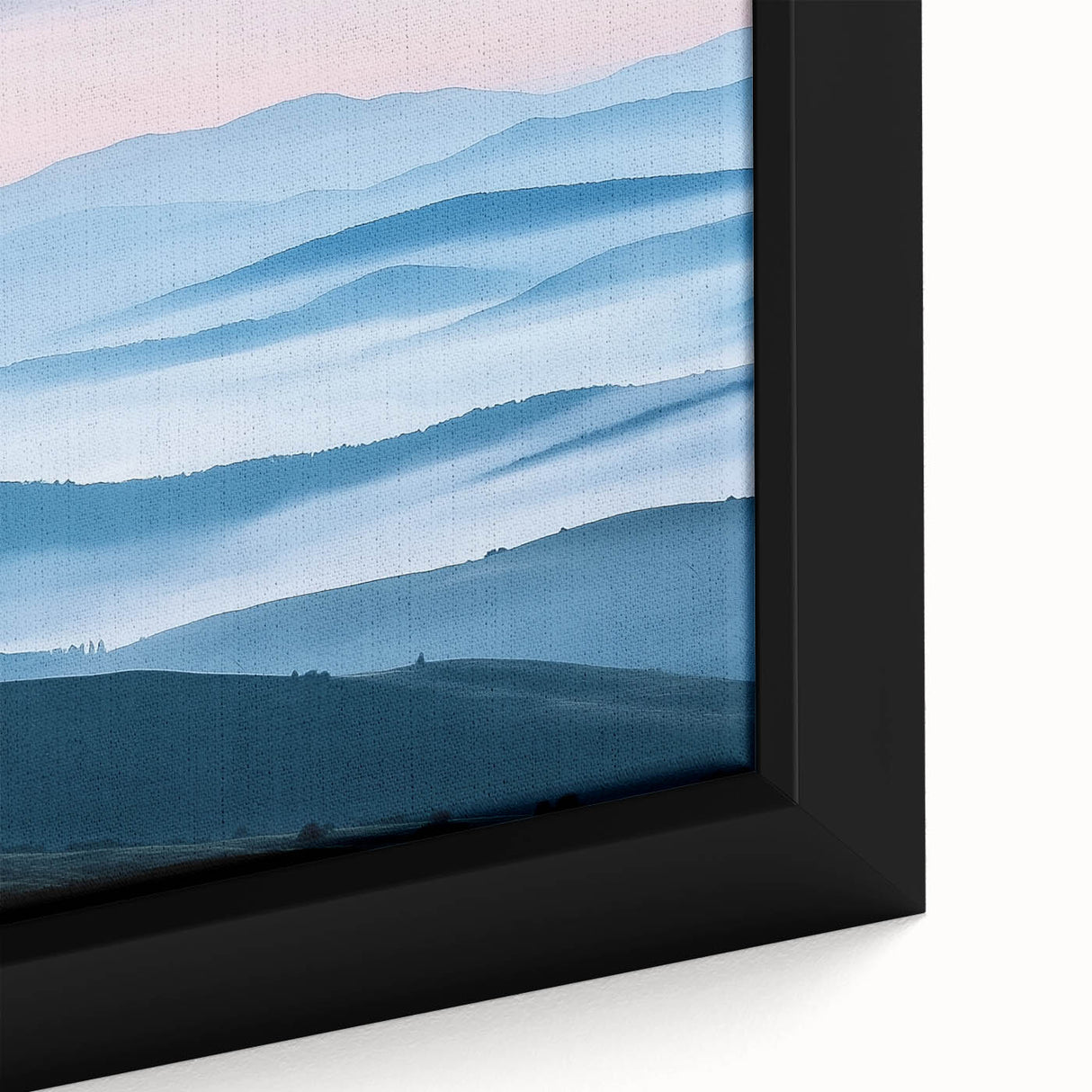 Close-up of a framed canvas featuring a serene countryside landscape with vibrant green fields, rolling hills, and a clear blue sky, perfect for home decor.