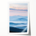 Rolled print showcasing a serene countryside landscape with lush greenery and rolling hills, beautifully packaged in a protective cardboard tube for easy transport.