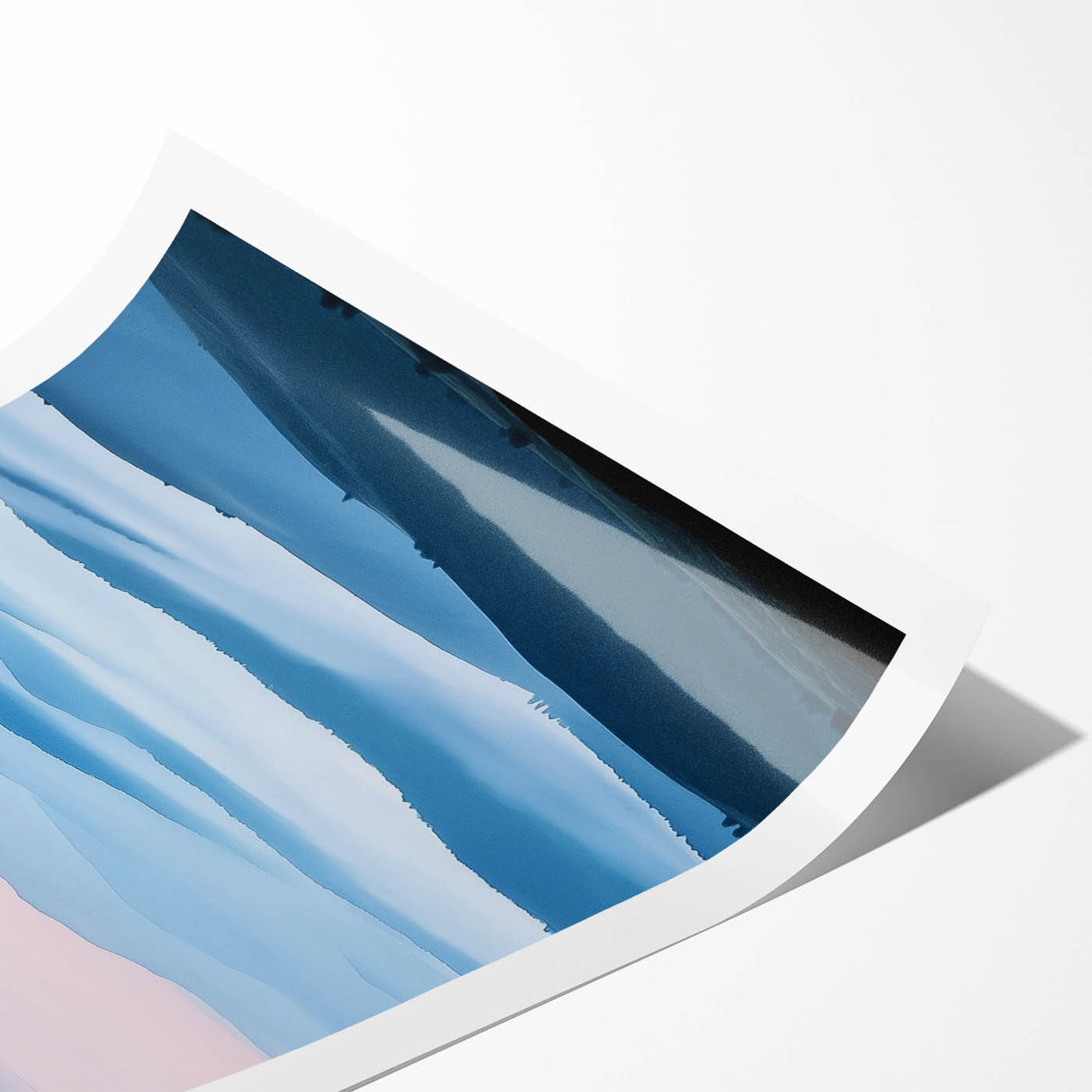 Rolling hills of a picturesque countryside landscape print featuring lush green fields and a serene blue sky, elegantly rolled for easy transport and display.